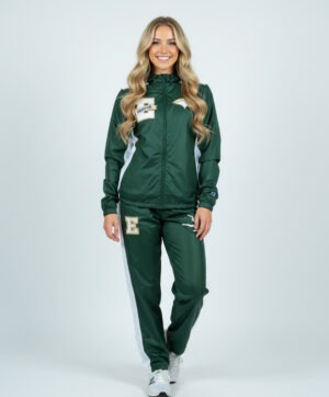 Model wearing the Champion Quest Warm-Up Set (Jacket and Open-Bottom Pants) made from polyester tricot.