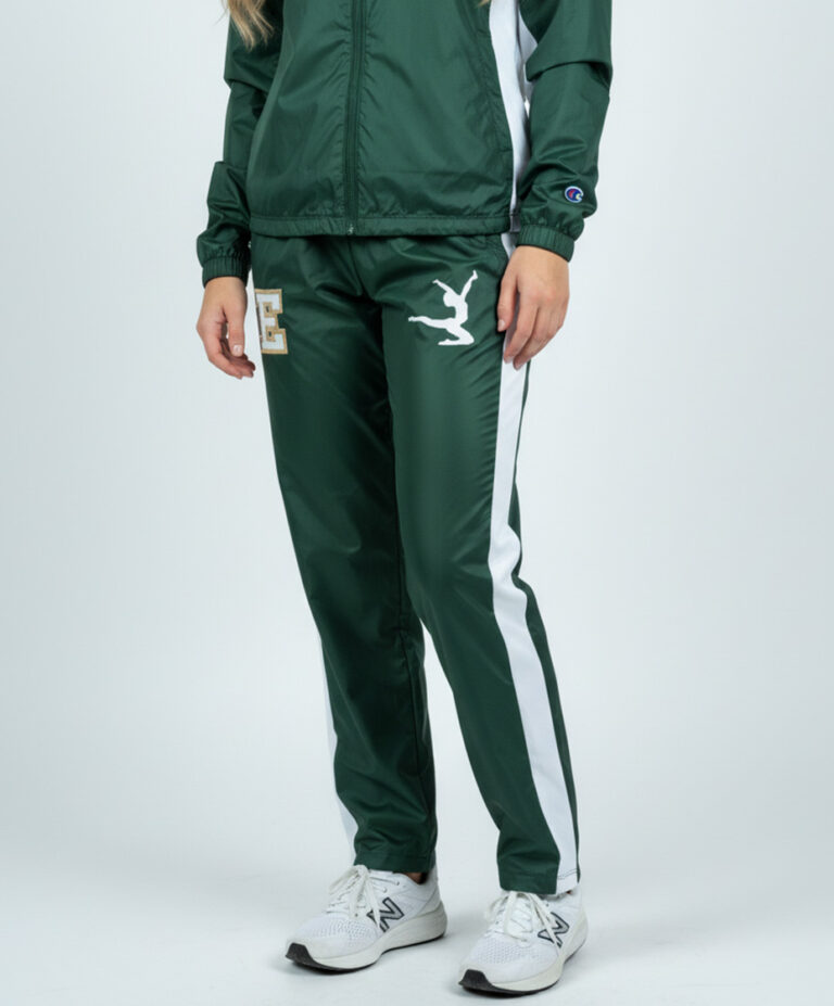 Model wearing the Champion Quest Warm-Up Set (Jacket and Open-Bottom Pants) made from polyester tricot.